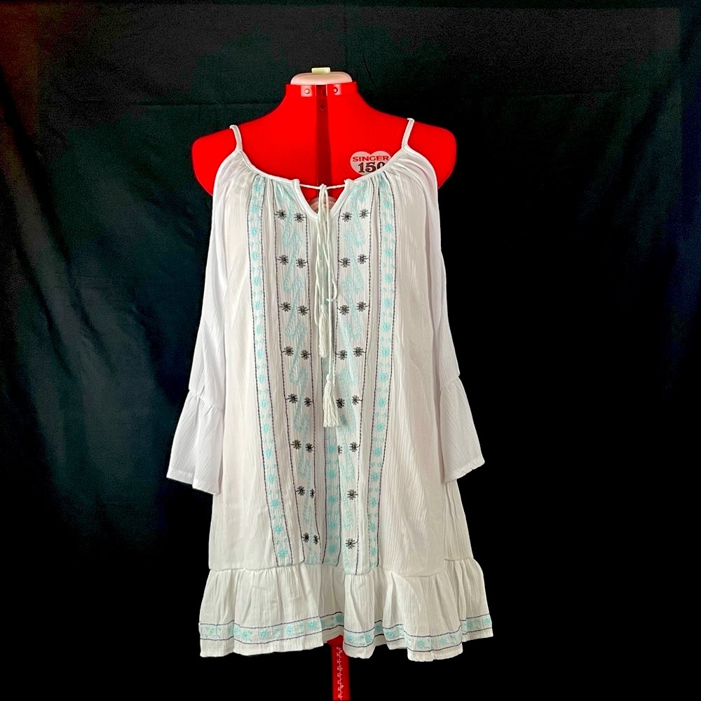 Exist dress with embroidery.